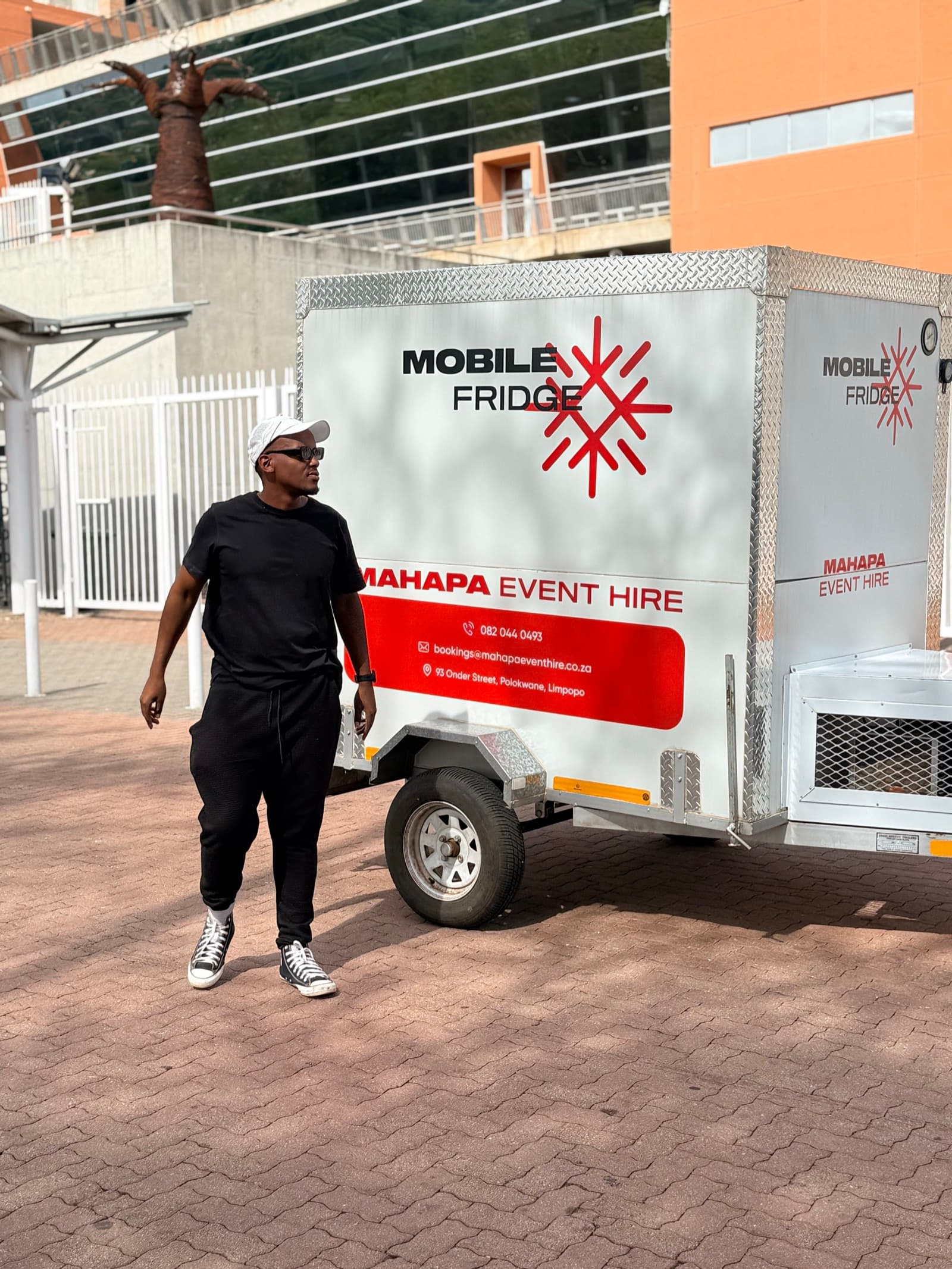 Mahapa Event Hire founder with branded mobile fridge trailer in Polokwane